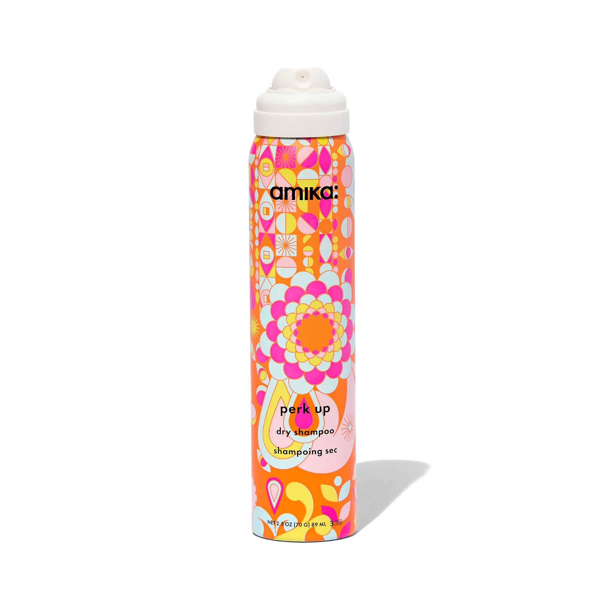 Dry shampoo bottle with colorful pattern and white spray cap, angled view