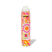 Dry shampoo bottle with colorful pattern and white spray cap, angled view