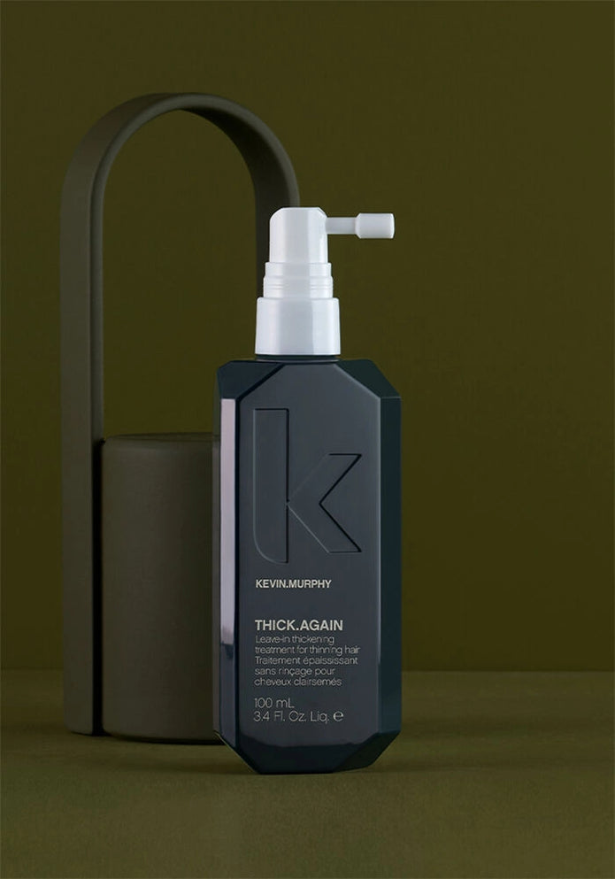 THICK.AGAIN leave-in thickening hair treatment bottle with pump, angled view
