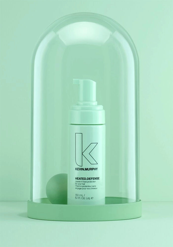Heated Defense hair protector pump bottle, light green, 150 mL under dome