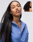 Model with long straight black hair, styled using a flat iron shown in inset