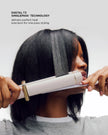 Satin Blush curling straightener pressed to hair for smoothing near roots