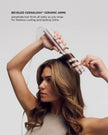 Satin Blush curling straightener lifting hair and forming soft waves