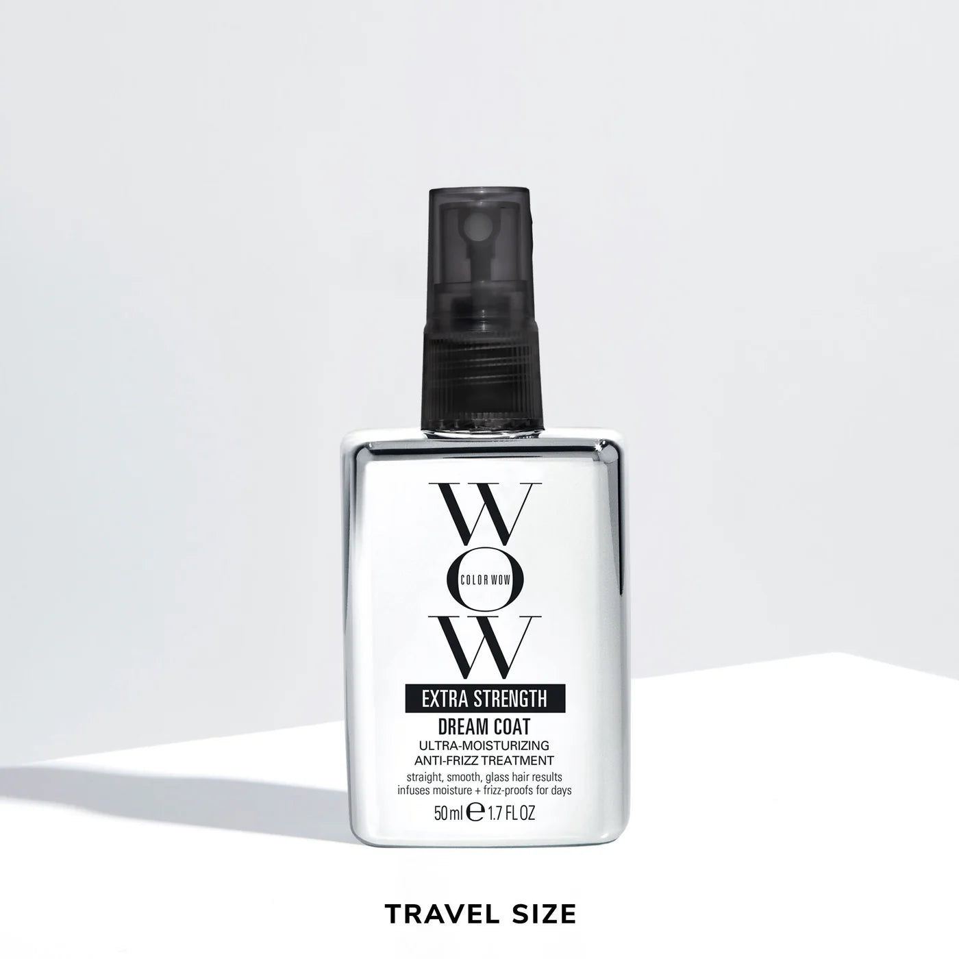 Travel-size Extra Strength Dream Coat anti-frizz spray bottle, 50 ml, flip-top nozzle