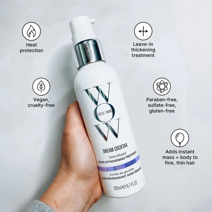 Dream Cocktail leave-in thickening treatment bottle with heat protection and vegan icons