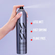 Hand holds Texas Hold’em big hold hairspray bottle; less wet, fast drying, flake-free