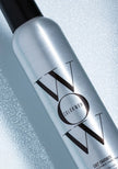Close-up of silver Extra Mist-ical Shine Spray bottle with black cap and Color Wow logo