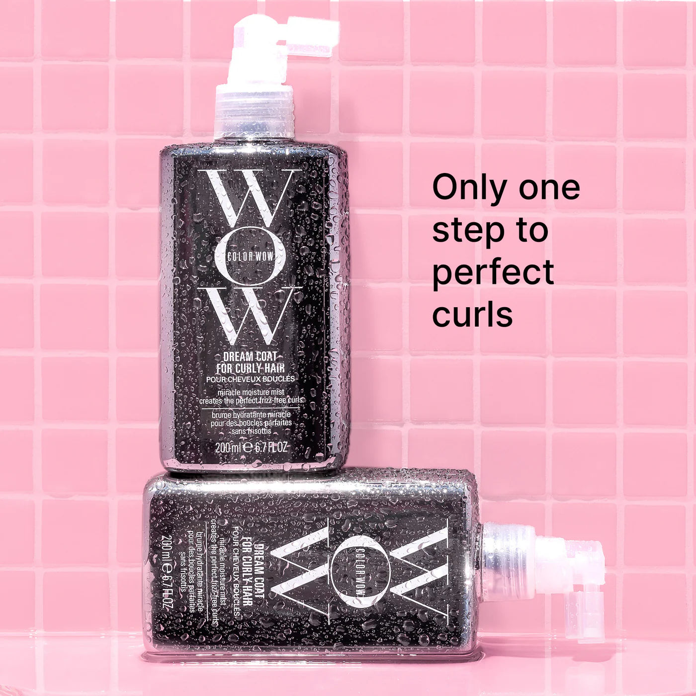 Two Dream Coat for Curly Hair mist bottles with pump tops and water droplets