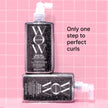 Two Dream Coat for Curly Hair mist bottles with pump tops and water droplets