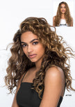 Model with long curly hair; inset shows before and after results