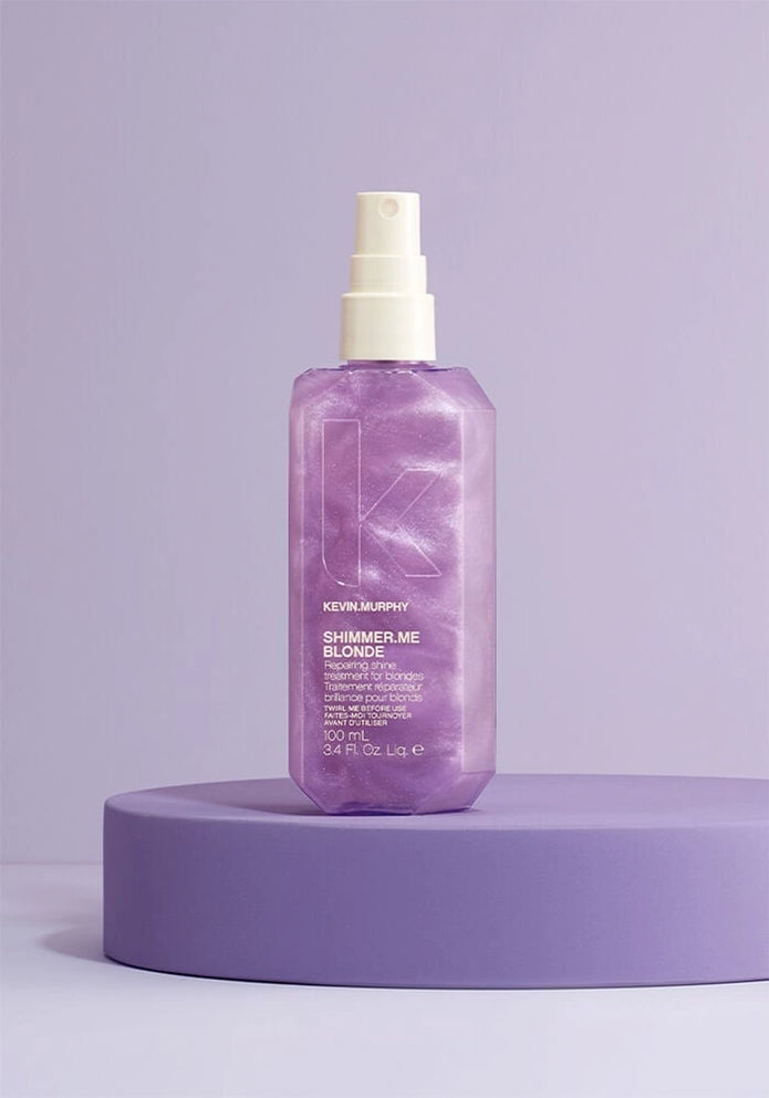 Purple Shimmer.Me Blonde bottle with white mist pump, shown on purple base