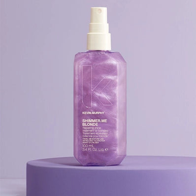 Purple Shimmer.Me Blonde bottle with white mist pump, shown on purple base