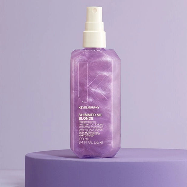 Purple Shimmer.Me Blonde bottle with white mist pump, shown on purple base