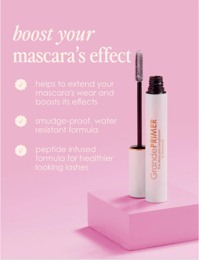 Mascara primer applicator bottle with wand brush, product shown beside tube