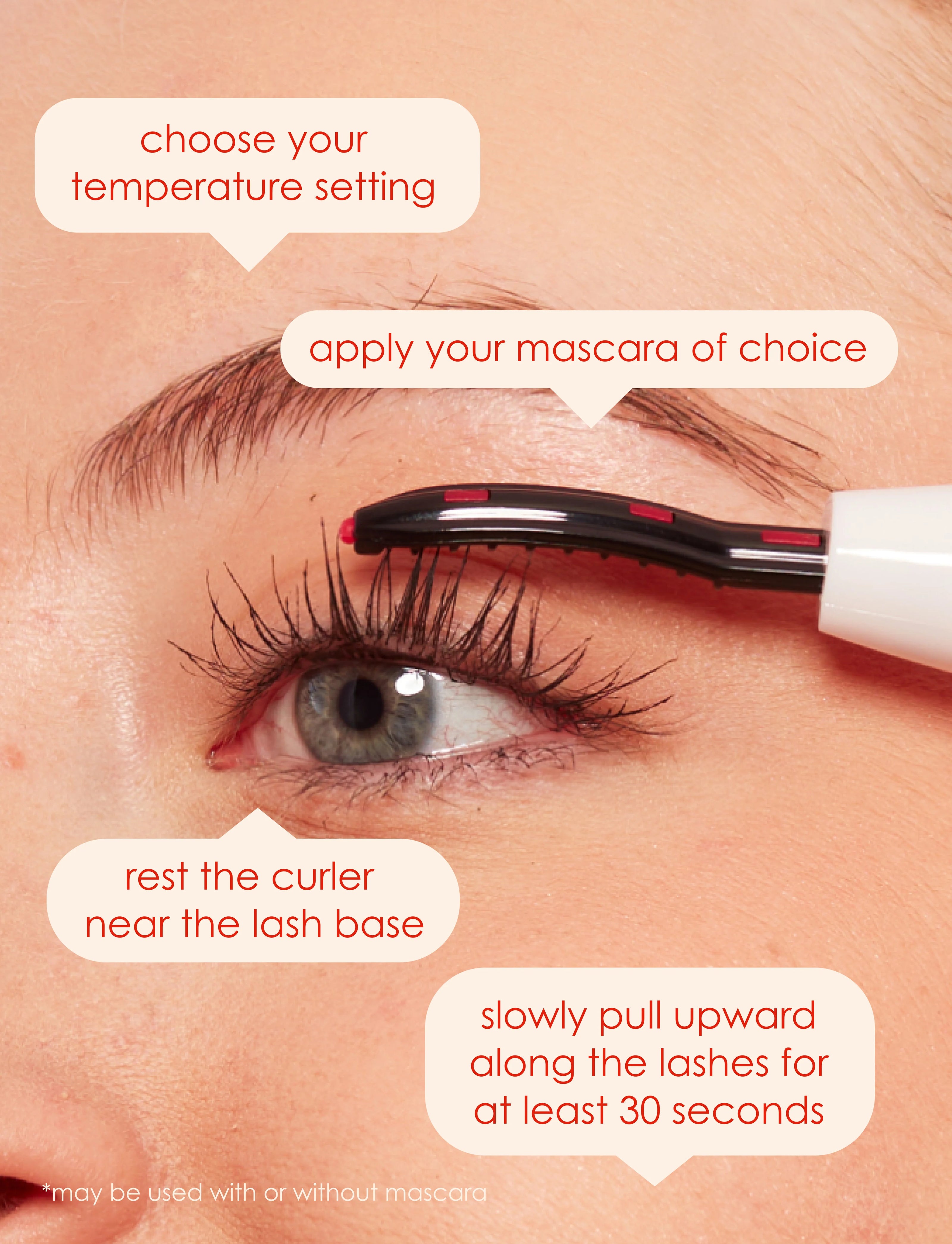 Heated lash curler warming lashes near the lash line on an eye