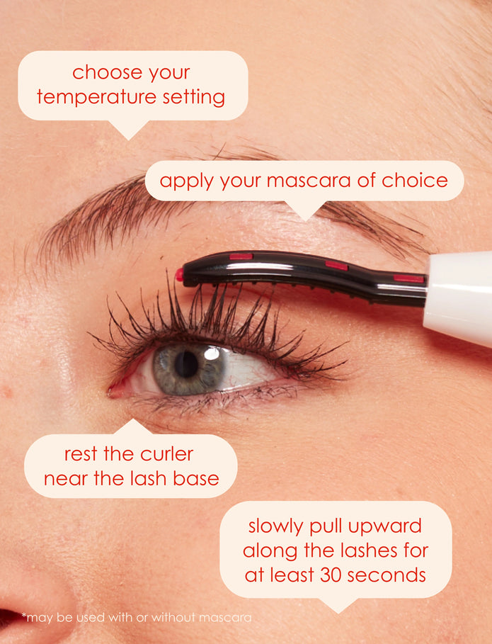 Heated lash curler warming lashes near the lash line on an eye