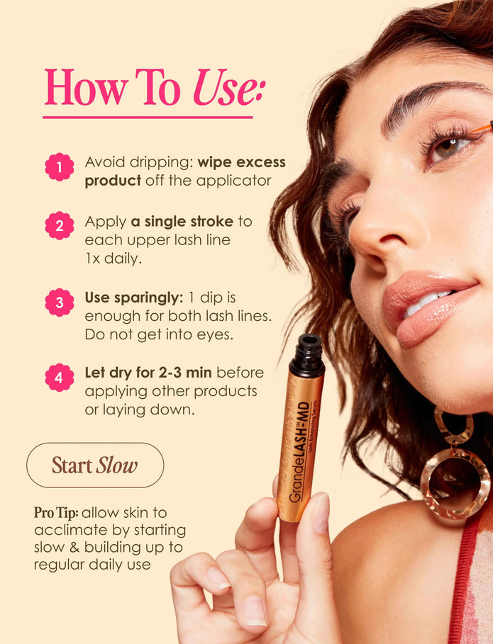 Lash enhancing serum applicator bottle held near face and open eye