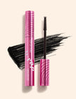 Pink tubing mascara tube with black wand and brush tips, extended lash look