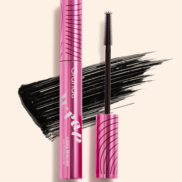 Pink tubing mascara tube with black wand and brush tips, extended lash look