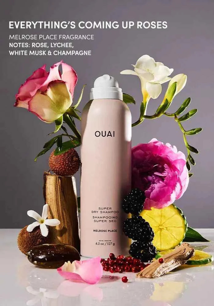 Ouai Super Dry Shampoo bottle, pale pink with label and white cap