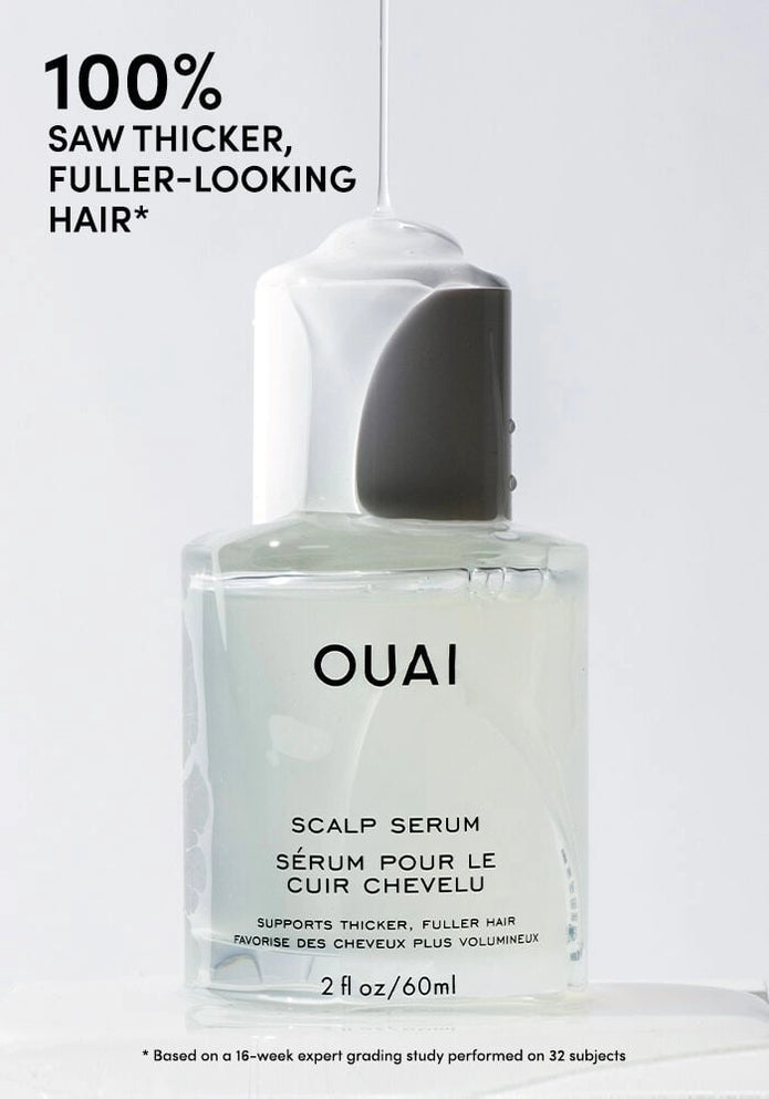 OUAI scalp serum bottle with text “100% saw thicker, fuller-looking hair”