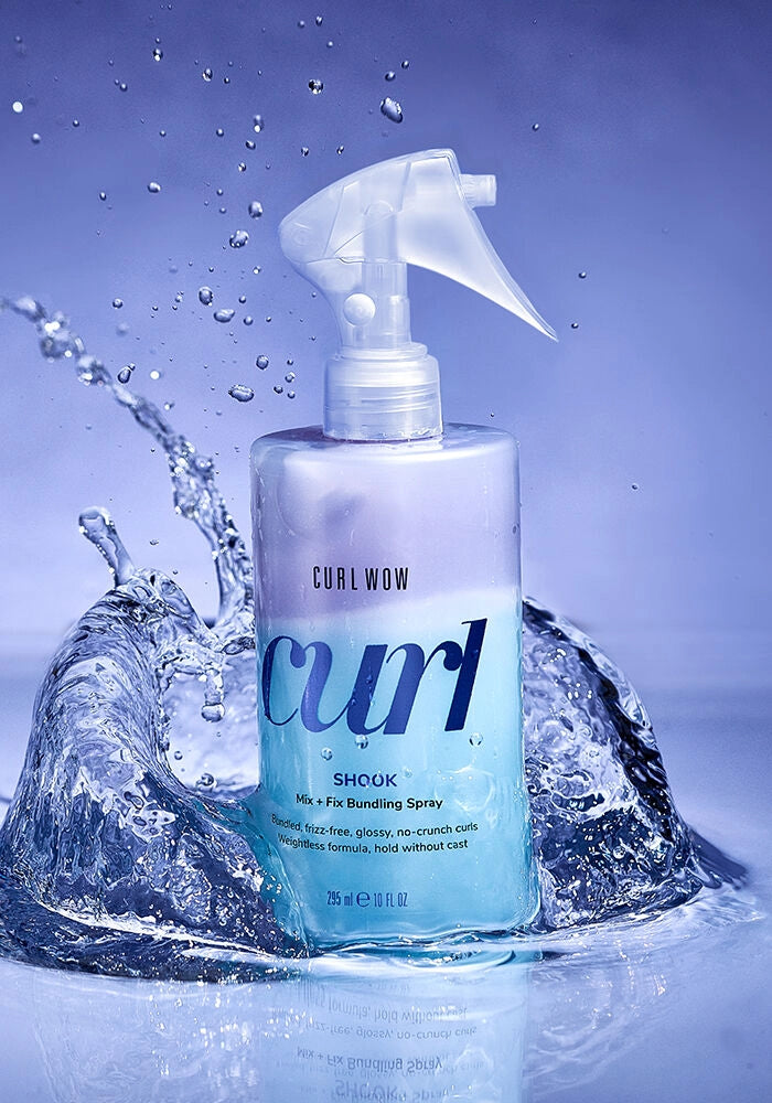 CURL WOW Shook spray bottle with nozzle, light blue liquid