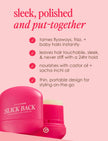Pink Slick Back castor oil hair taming stick partially shown in packaging