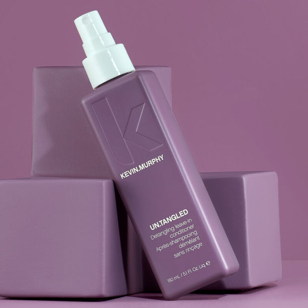 UN.TANGLED detangling leave-in conditioner bottle with pump, purple, 150 mL