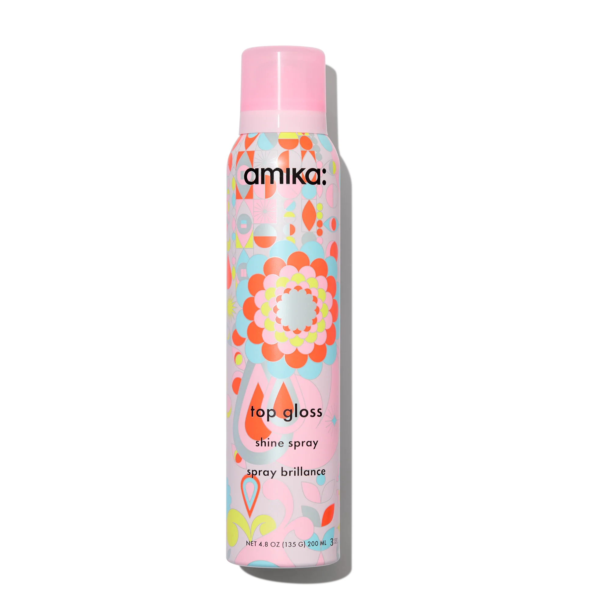 Amika Top Gloss shine spray bottle with colorful floral pattern label
