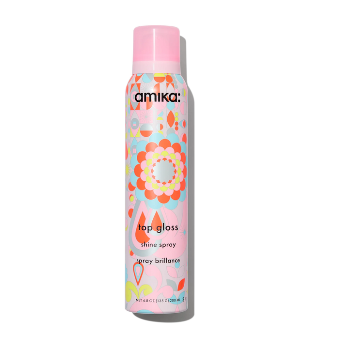 Amika Top Gloss shine spray bottle with colorful floral pattern label