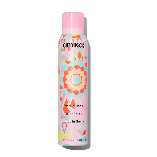 Amika Top Gloss shine spray bottle with colorful floral pattern label