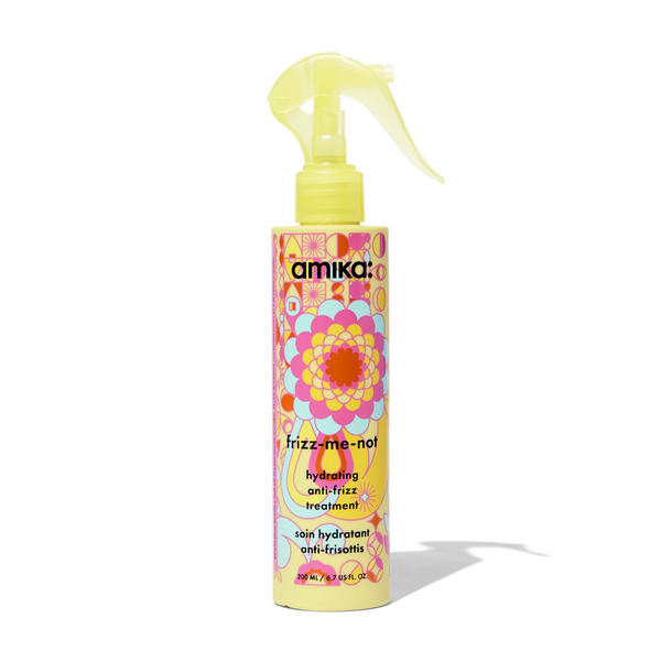 Yellow anti-frizz hair treatment bottle with pump sprayer, colorful label