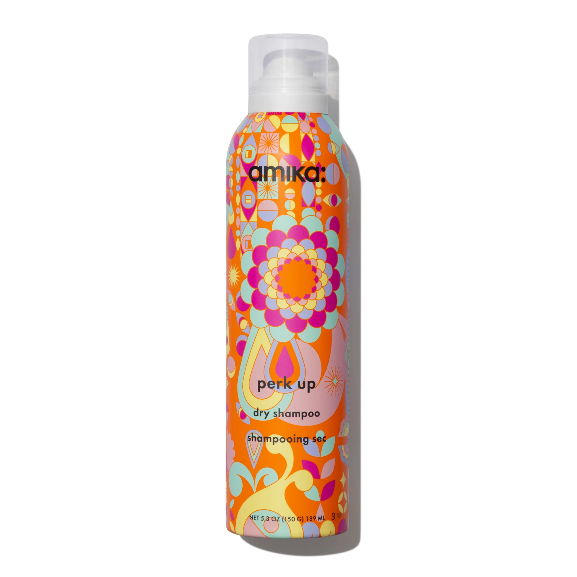 Dry shampoo canister with colorful floral pattern and white spray cap