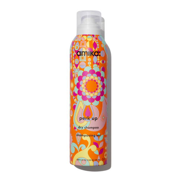 Dry shampoo canister with colorful floral pattern and white spray cap