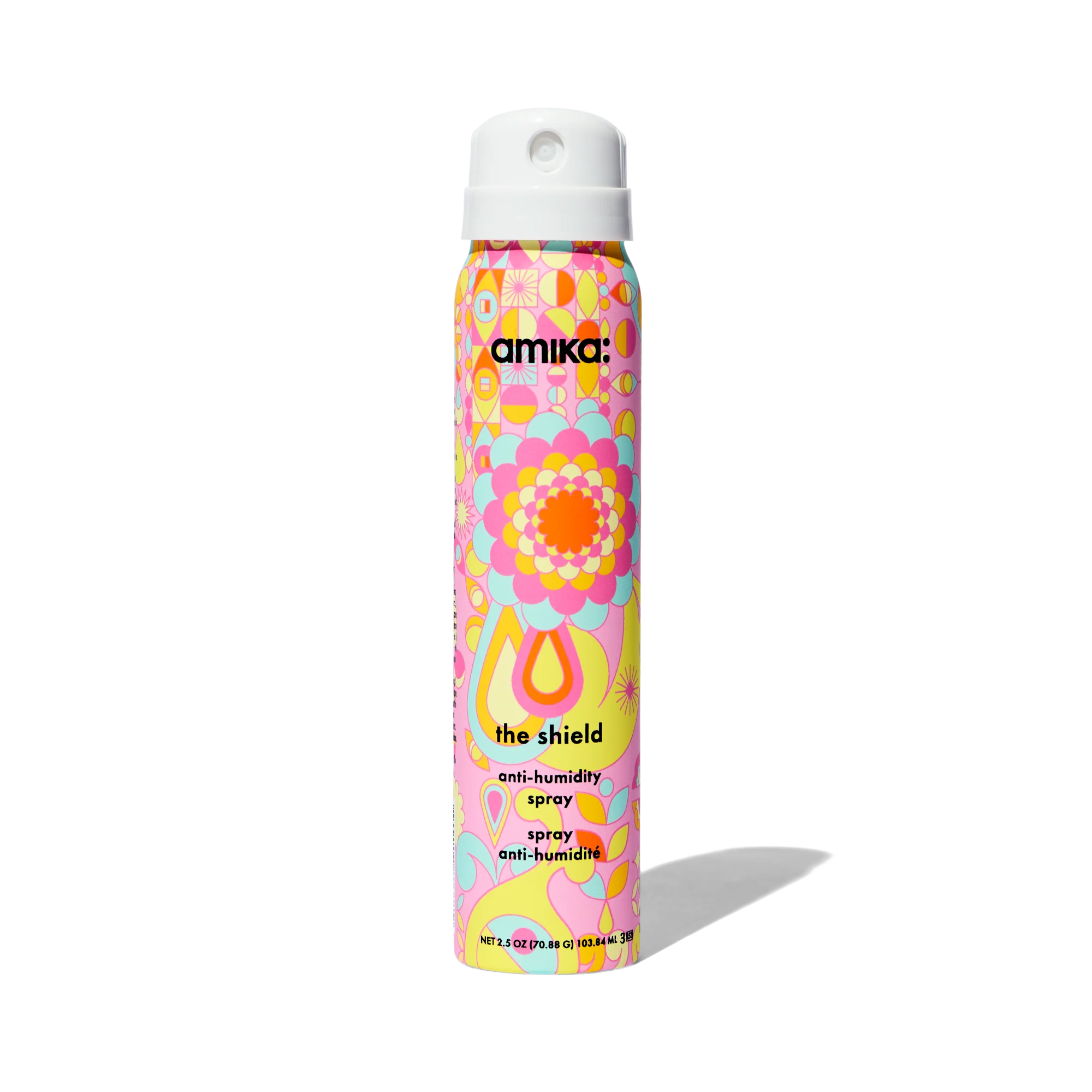 The Shield anti-humidity spray bottle in colorful floral print, angled view