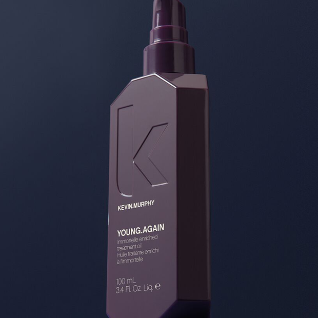 YOUNG.AGAIN 100 mL treatment oil bottle with pump, angled front view